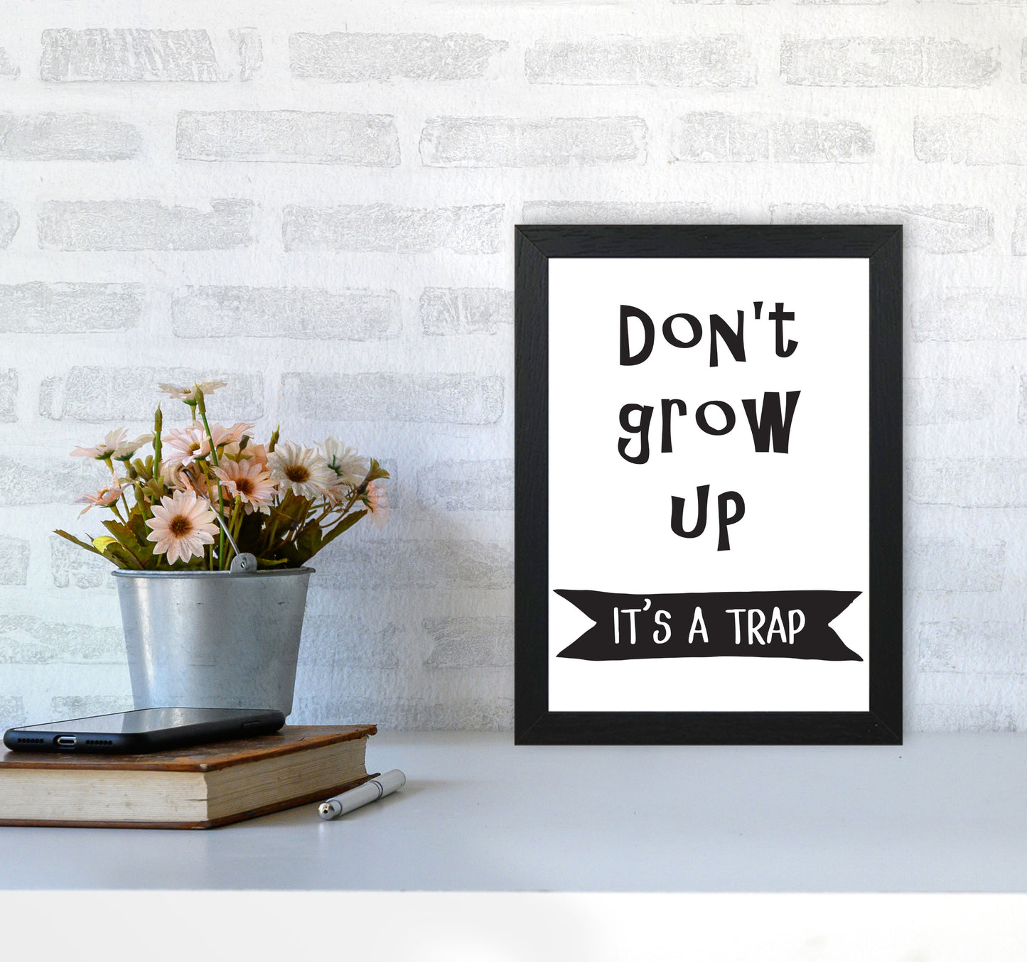 Don't Grow Up It's A Trap Banner Framed Typography Wall Art Print A4 White Frame