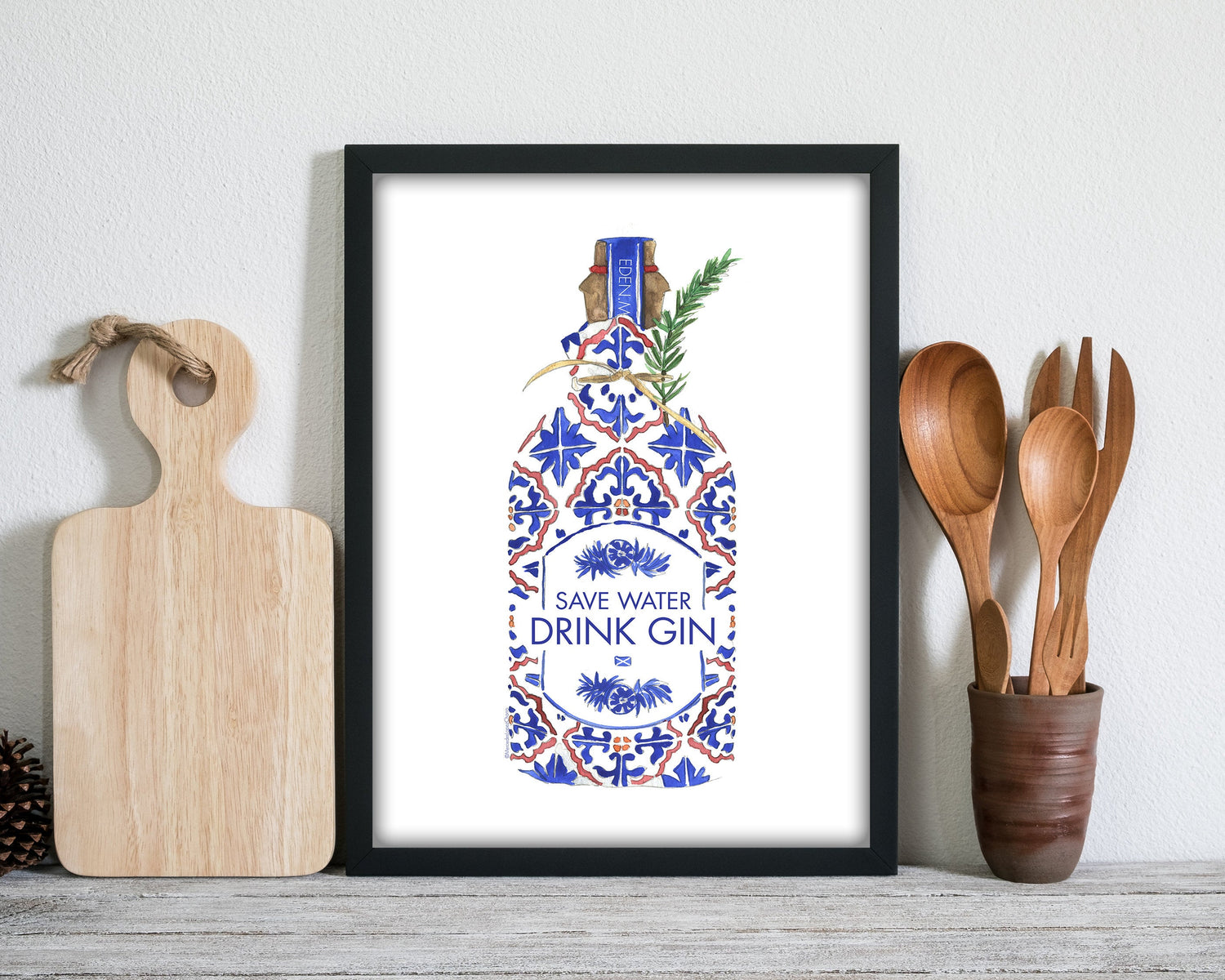 kitchen wall art print featuring a save water, drink gin poster in black frame in a kitchen setting