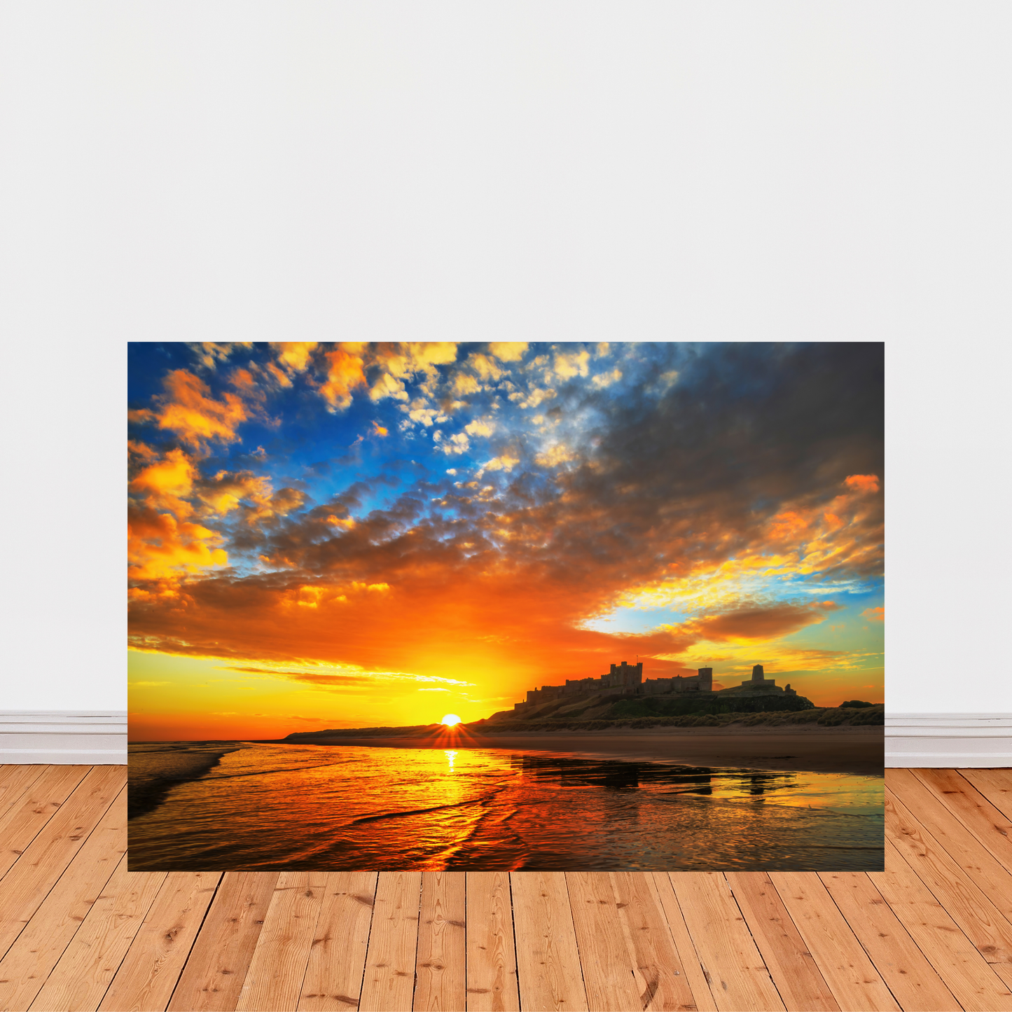 A Beautiful Sunrise at Bamburgh Castle by Steven Robinson