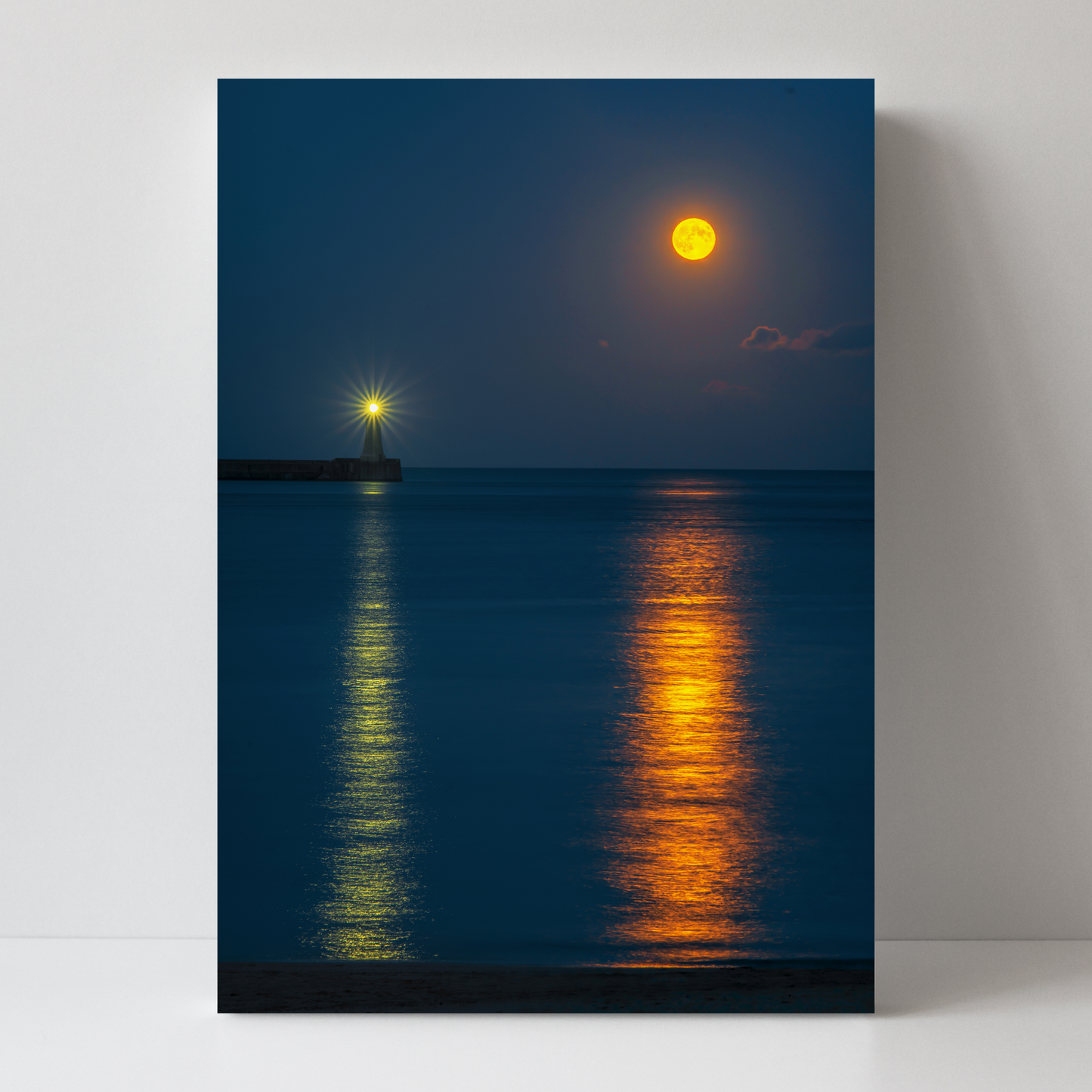 Moon and Lighthouse Reflections at Tynemouth by Steven Robinson