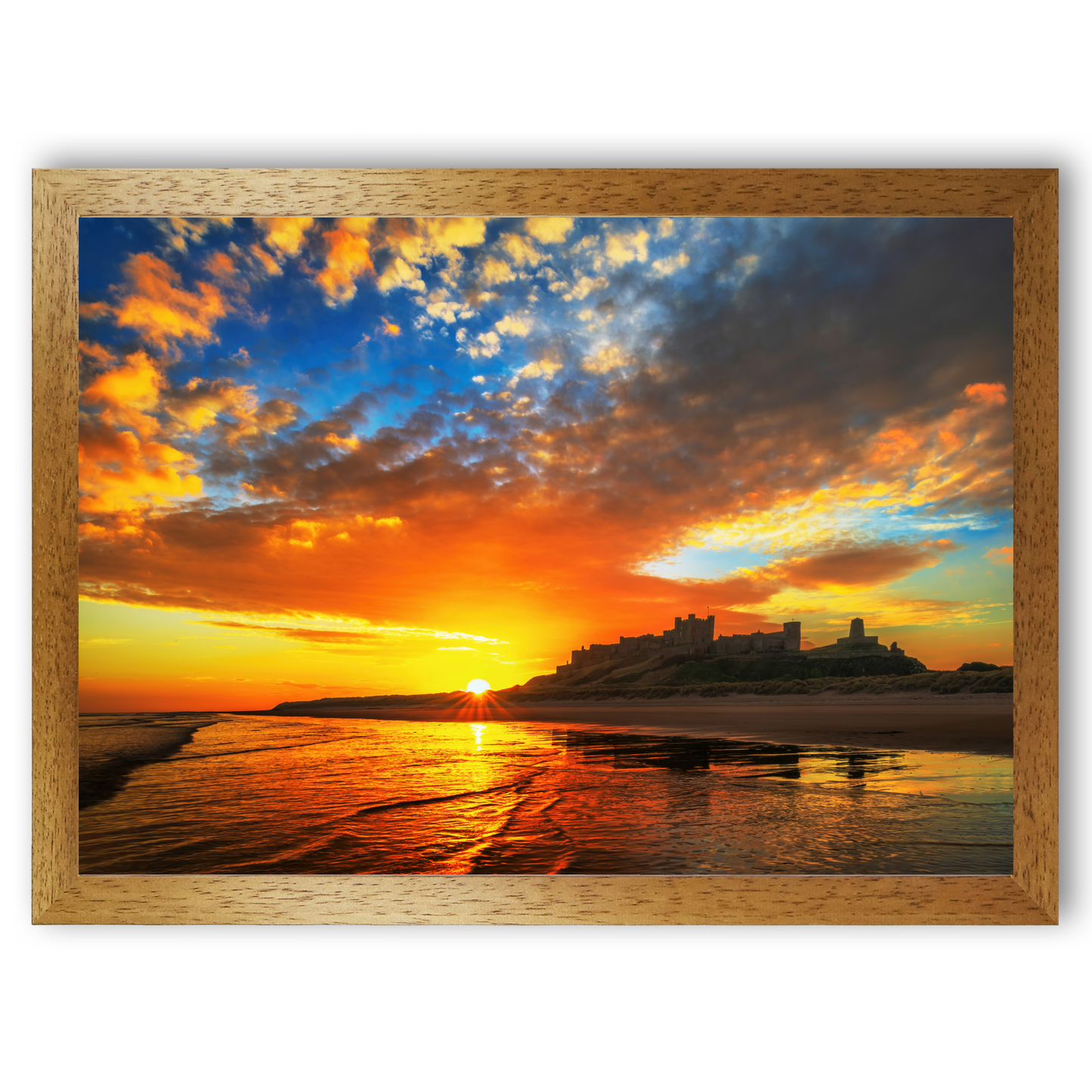 A Beautiful Sunrise at Bamburgh Castle by Steven Robinson