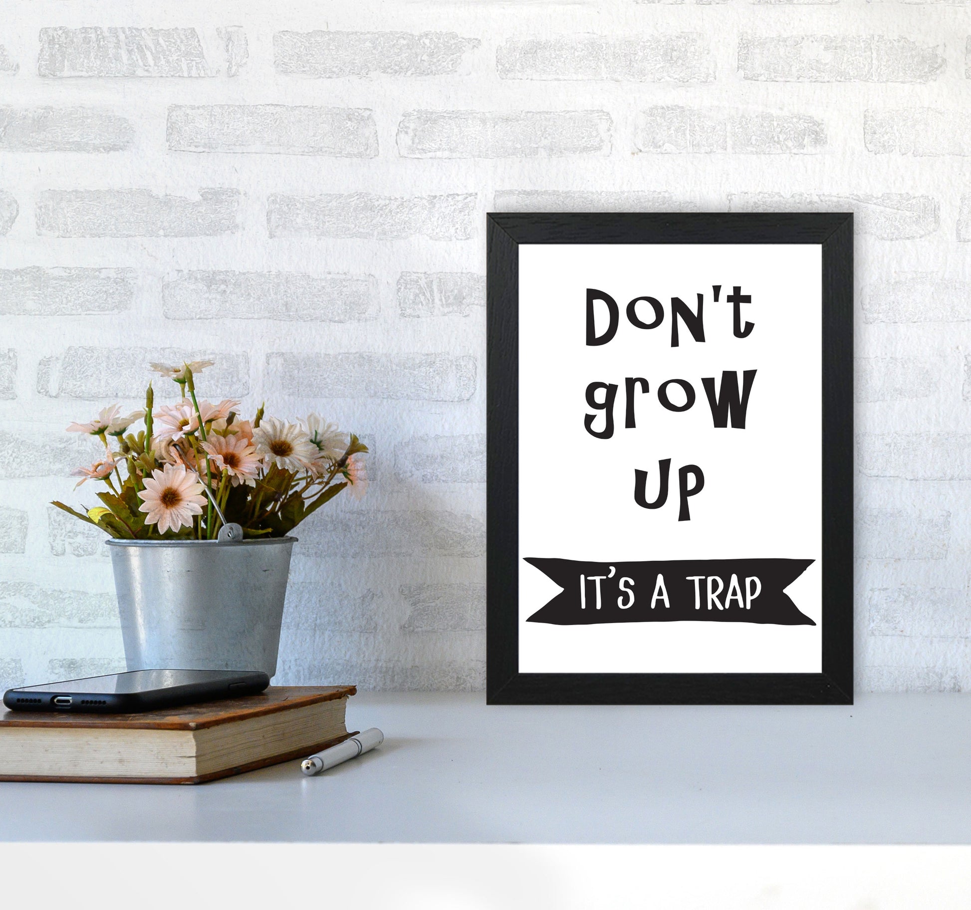 Don&#39;t Grow Up It&#39;s A Trap Banner Framed Typography Wall Art Print A4 White Frame