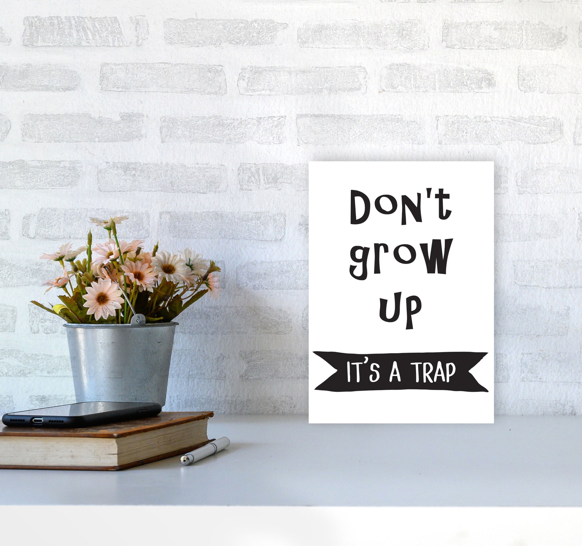 Don&#39;t Grow Up It&#39;s A Trap Banner Framed Typography Wall Art Print A4 Black Frame