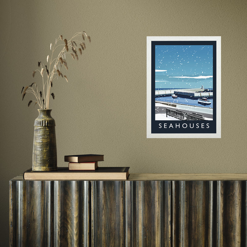 Seahouses (snow) portrait by Richard O'Neill A3 White Frame